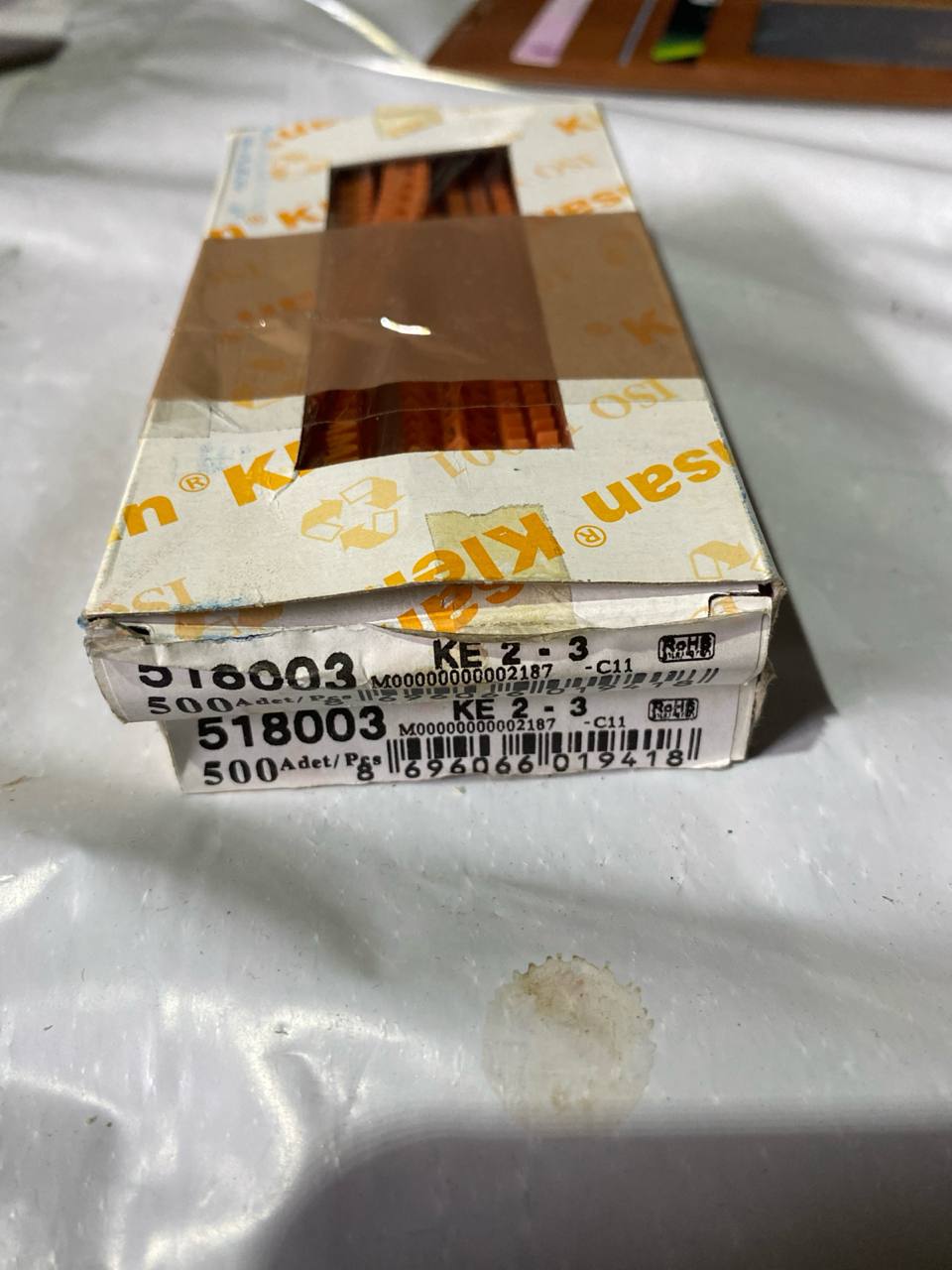 518003